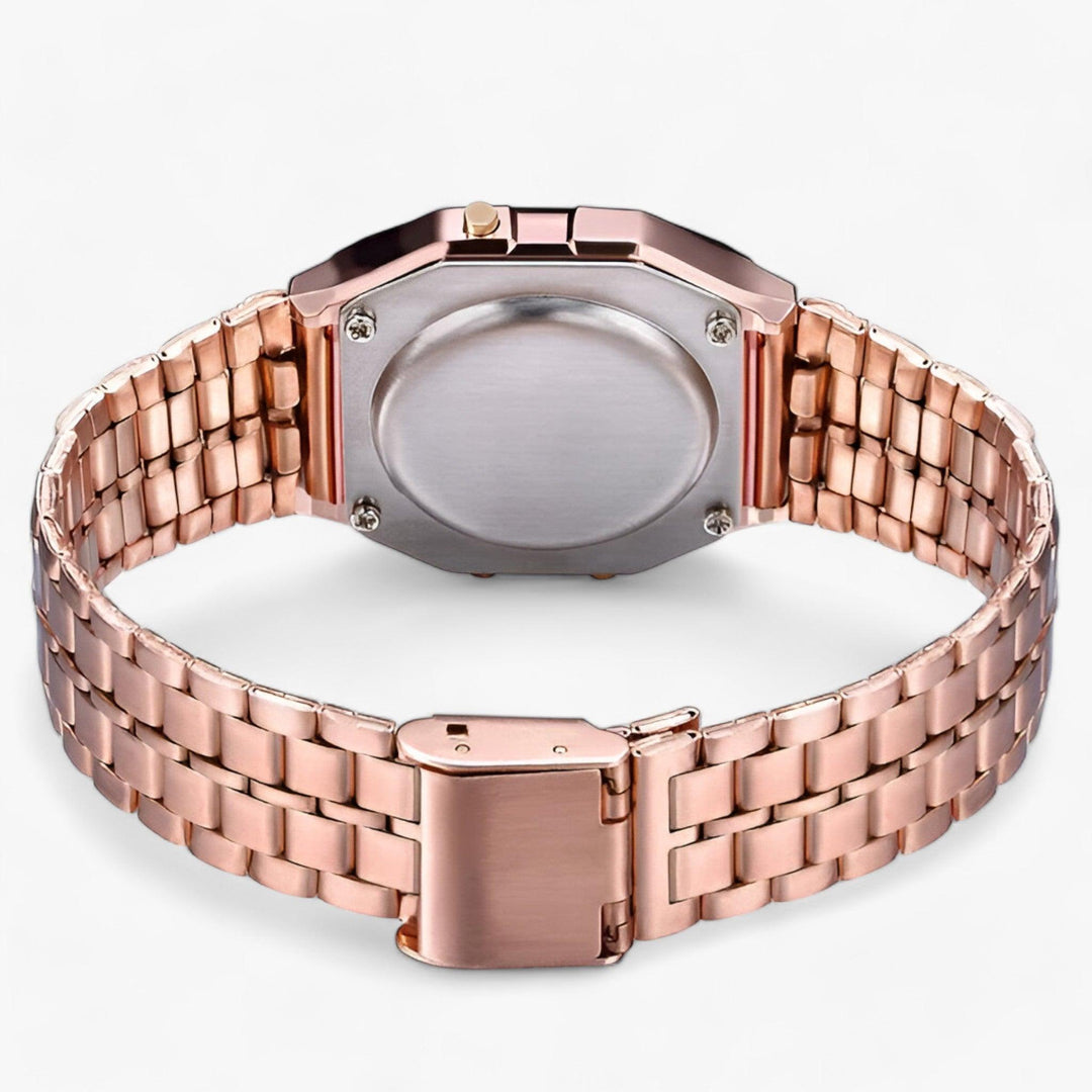Gold women's digital wrist watch with a minimalist square dial. A timeless and elegant daily accessory.