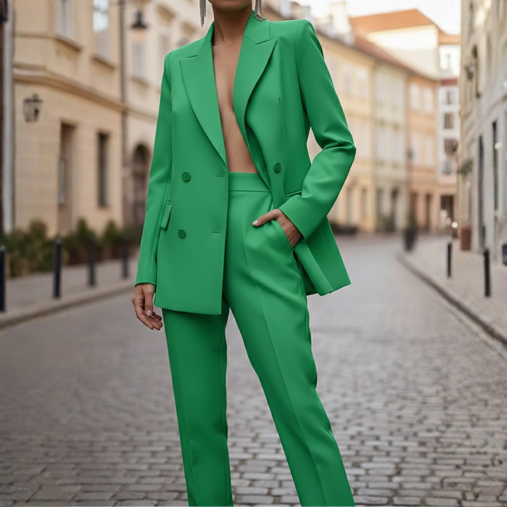 Sophisticated women's double-breasted blazer & straight leg pant suit, a polished and elegant business look.