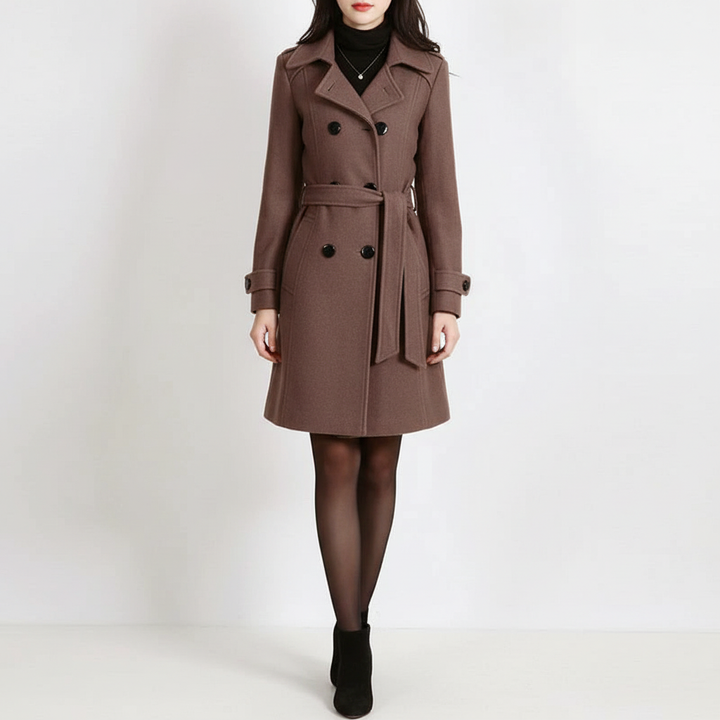 Sophisticated women's long coat, double-breasted and belted, a versatile piece for elegant style