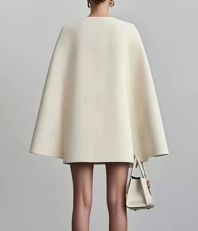 Sophisticated women's cape sleeve mini dress, double-breasted design, ideal for business or formal events.