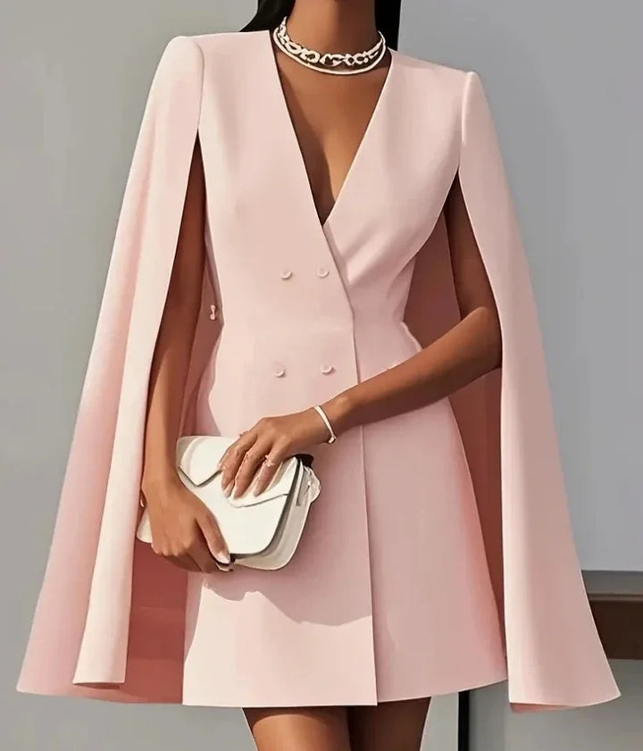 Women's formal mini dress with unique double-breasted front and chic cape sleeves for an elegant look.