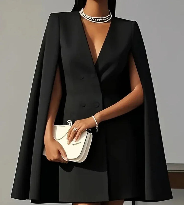 Sophisticated women's business attire mini dress, double-breasted design, elegant cape sleeves.