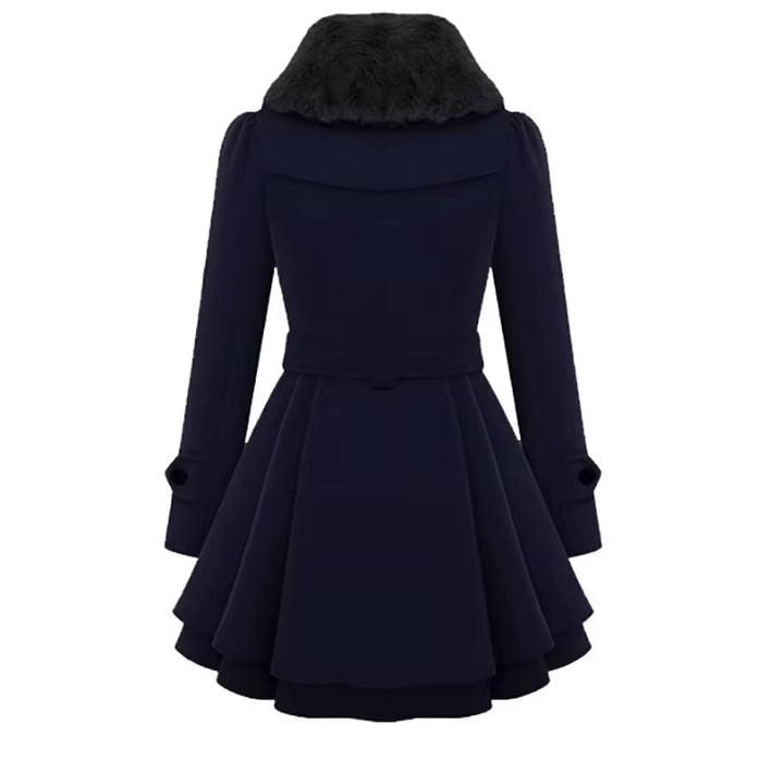 Cozy women's winter coat, double-breasted, with a soft faux fur collar and elegant layered hem.