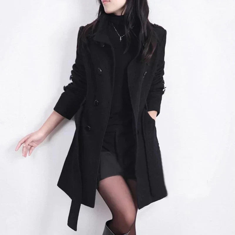 Elegant women's double-breasted trench coat with a stylish belted waist, perfect for classic fall fashion.