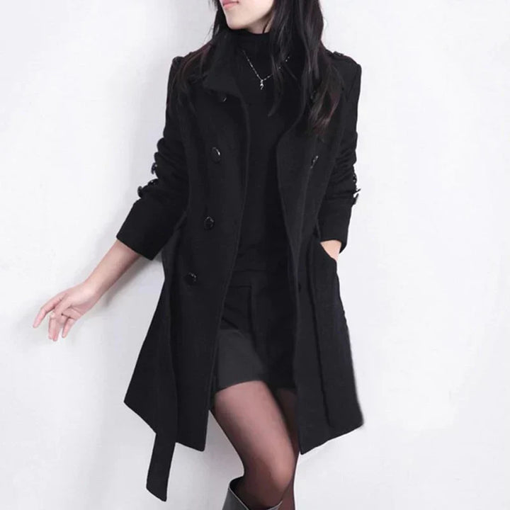 Elegant women's double-breasted trench coat with a stylish belted waist, perfect for classic fall fashion.