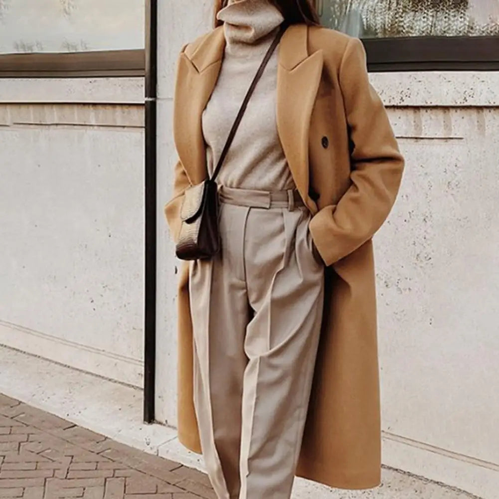 Classic women's double-breasted long trench coat, a versatile fall & winter outerwear piece with a structured, chic style.