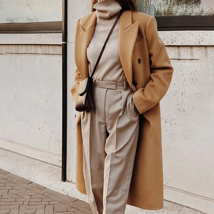 Classic women's double-breasted long trench coat, a versatile fall & winter outerwear piece with a structured, chic style.