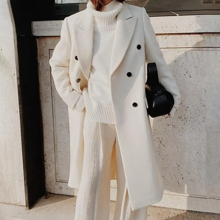 Chic women's double-breasted trench coat featuring a notch collar, ideal elegant outerwear for work and classic fashion.