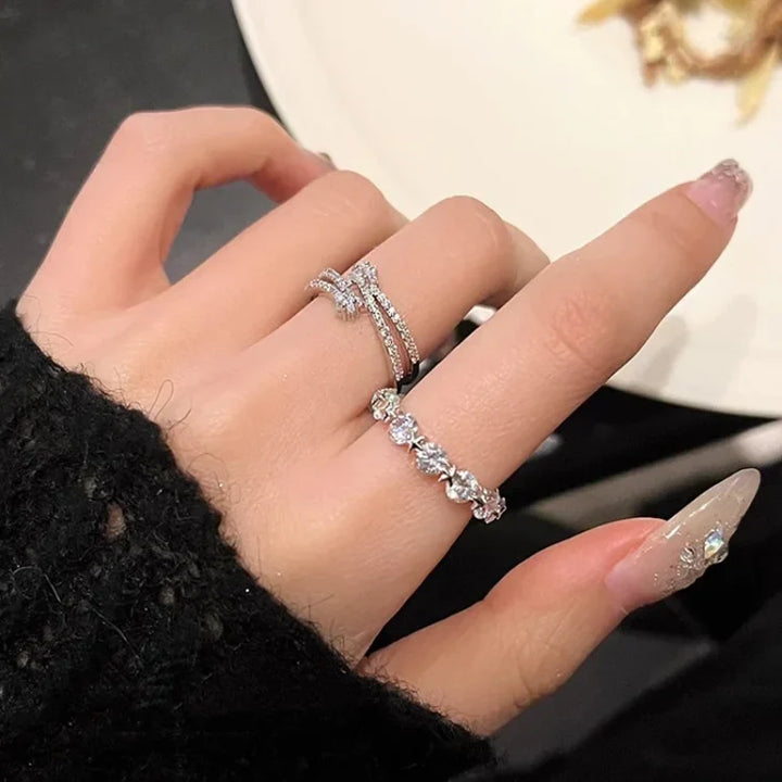 Chic women's layered star ring set in silver with dazzling zirconia accents. A perfect elegant celestial gift for her.