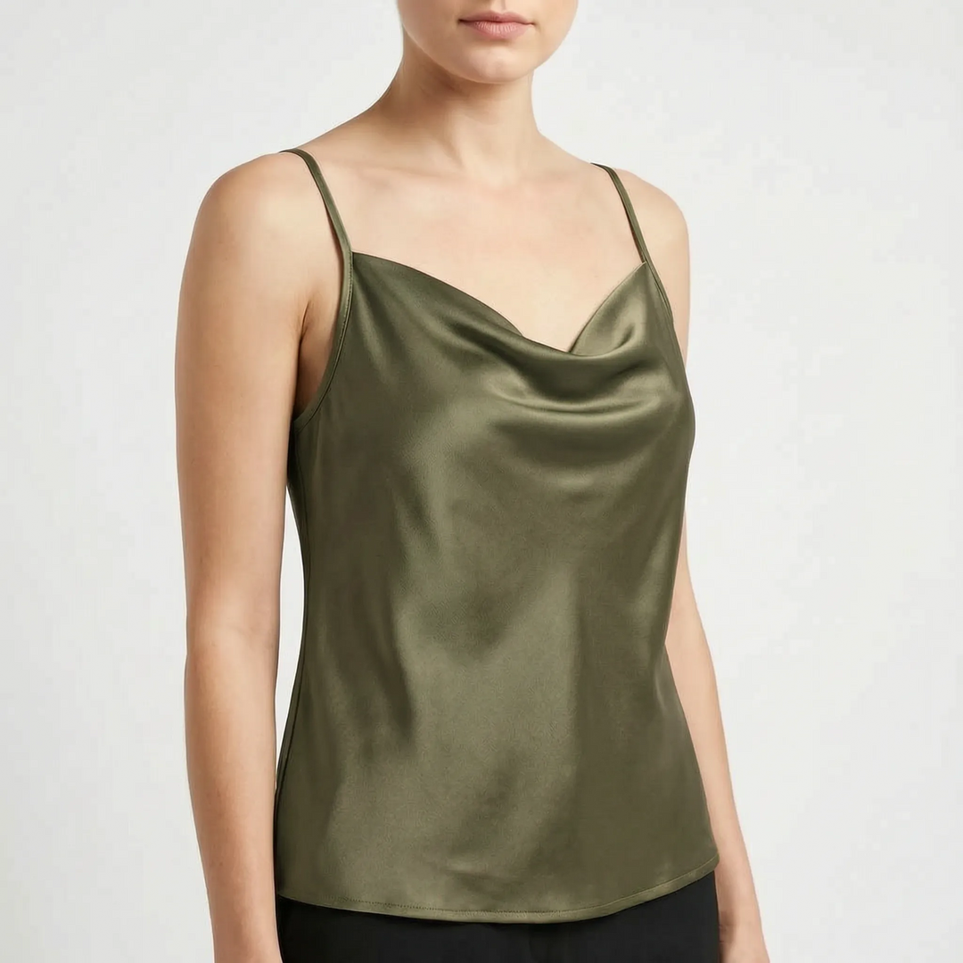 Soft, flowing fabric of an elegant women's draped camisole top, ideal for summer comfort.