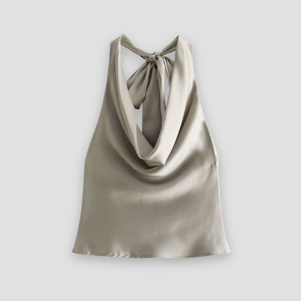 Smooth satin halter top for women, featuring elegant draping & a sleeveless design. Ideal for dressy occasions.
