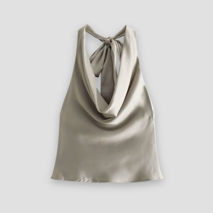 Smooth satin halter top for women, featuring elegant draping & a sleeveless design. Ideal for dressy occasions.