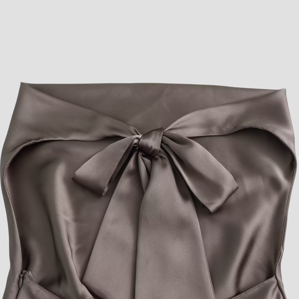 Versatile women's elegant satin tank top, featuring a draped halter neck. Stylish for both casual & dressy events.