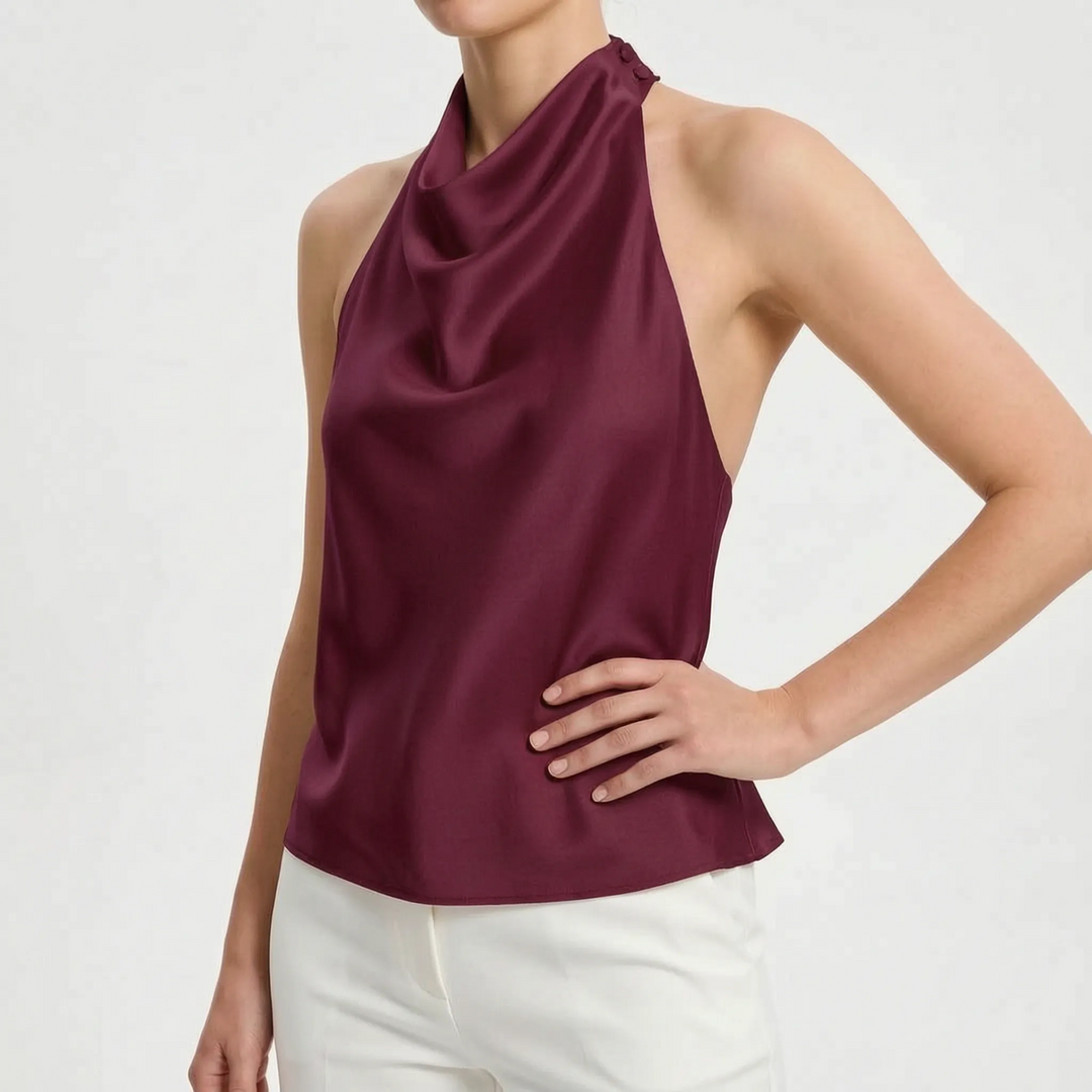 Elegant women's evening wear halter top, featuring a sophisticated draped front and backless style.
