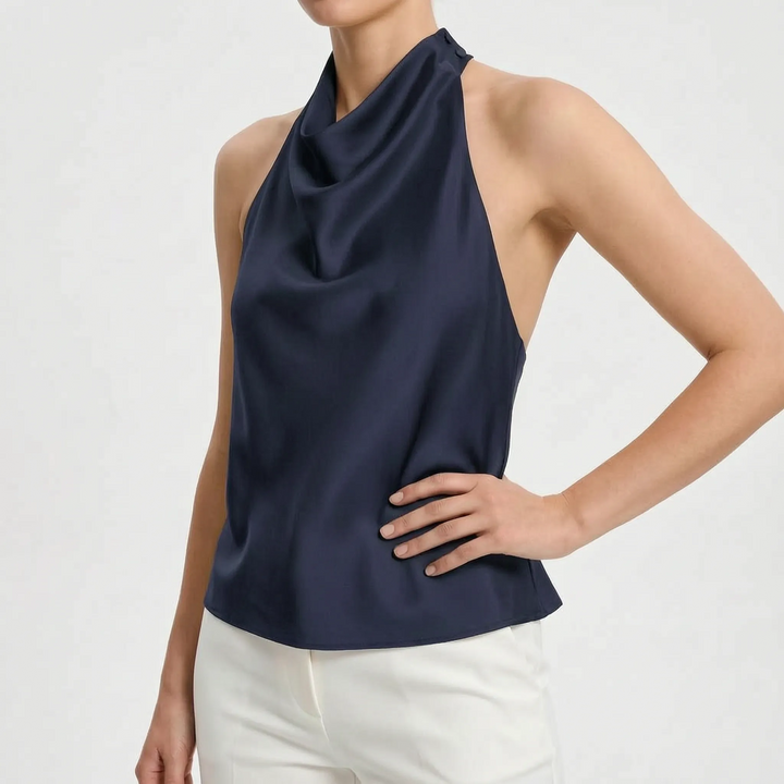 Chic sleeveless halter top for women with a beautiful draped neckline, ideal for parties.