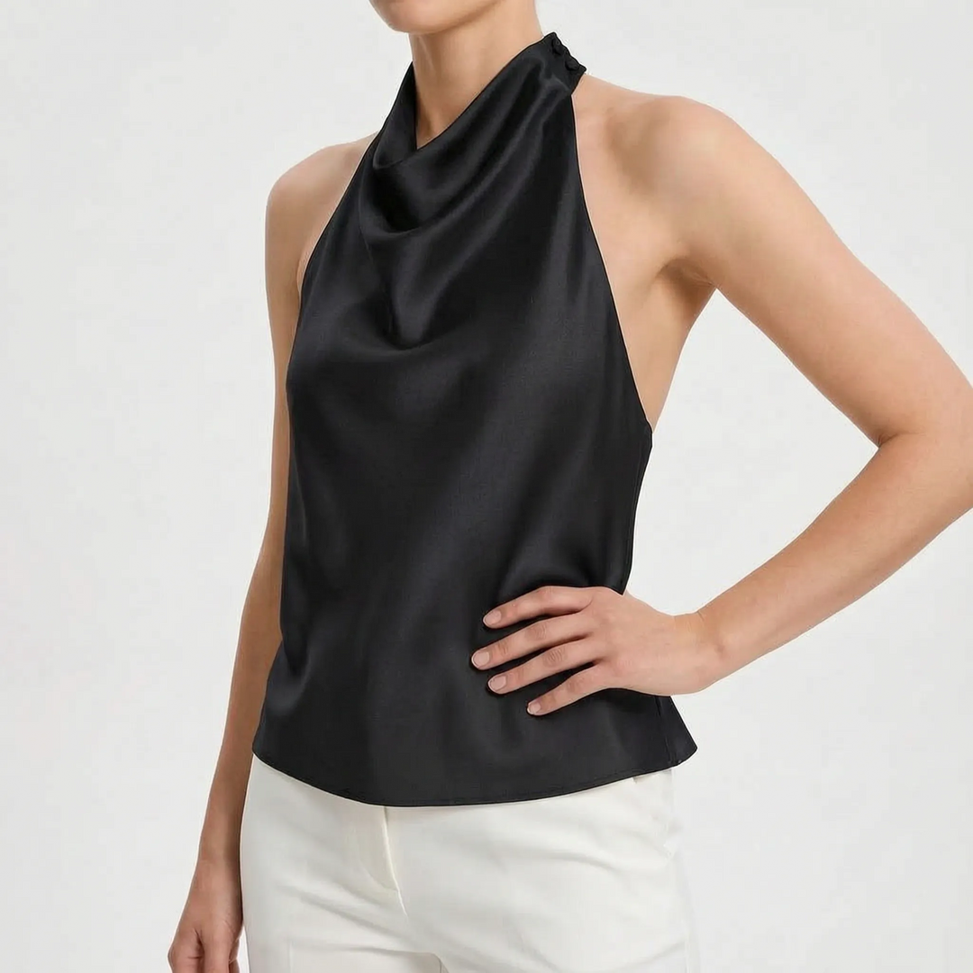 Women's casual elegant summer top, a backless draped halter with a comfortable sleeveless fit.