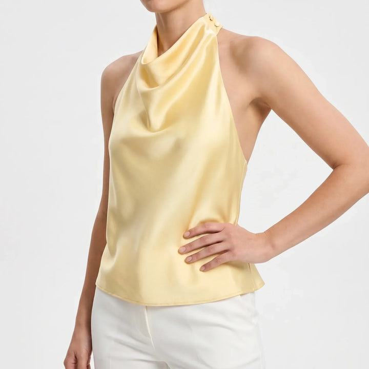 Sophisticated backless party top for women, a solid color draped halter perfect for fashion.