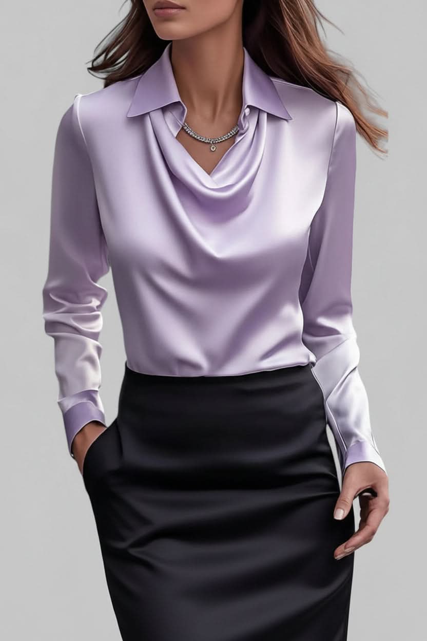 Sophisticated women's long sleeve blouse featuring an elegant drape, perfect for a polished, modern look.