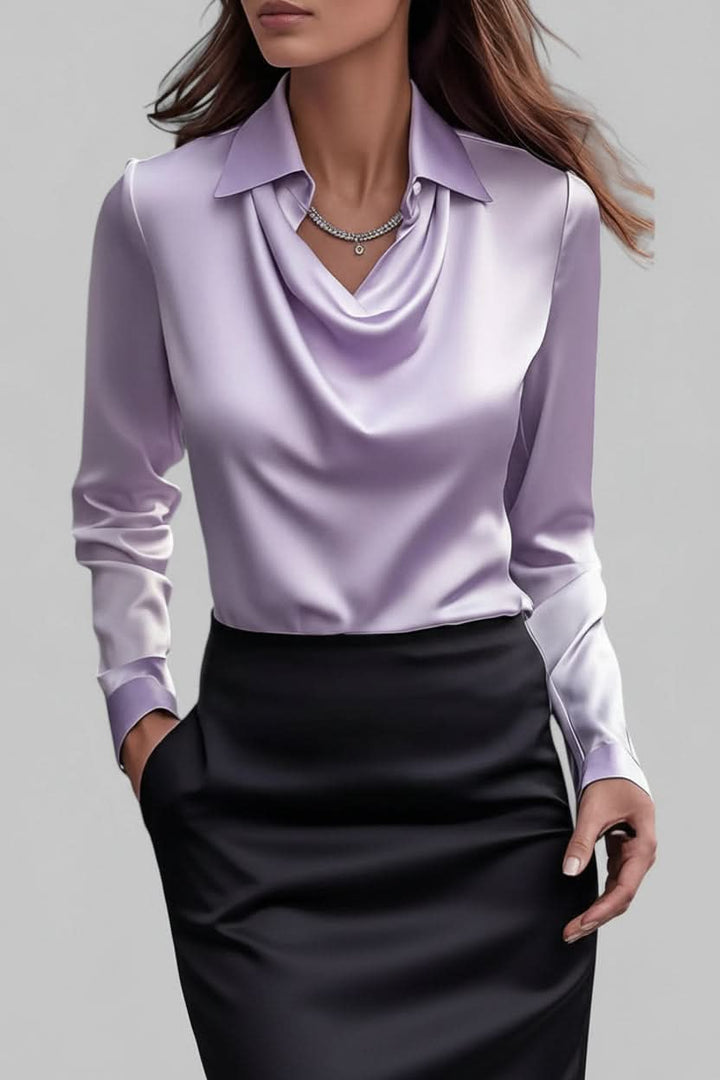 Sophisticated women's long sleeve blouse featuring an elegant drape, perfect for a polished, modern look.