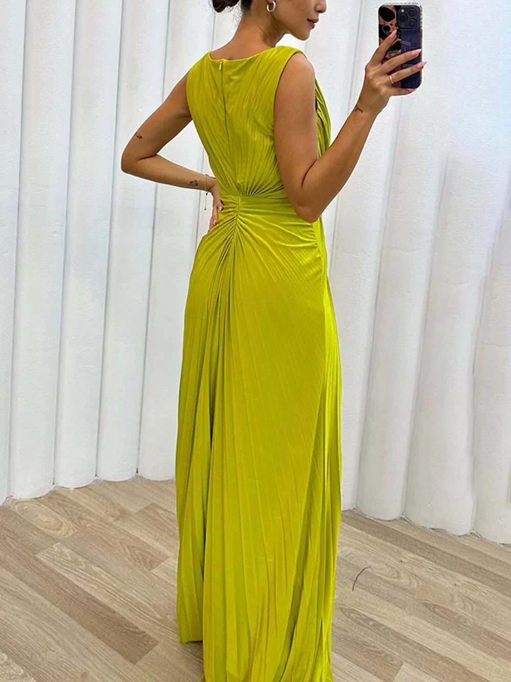 Luxurious ruched and draped maxi wedding guest dress for women, an elegant and comfortable choice for formal events.