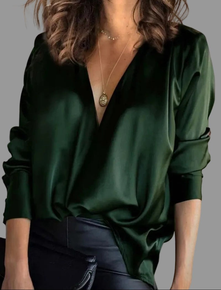 Elegant women's draped v-neck blouse in a relaxed fit, perfect for versatile evening wear or chic party outfits.
