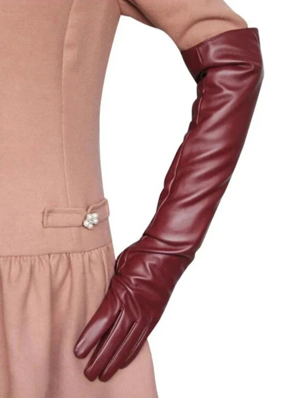Soft women's elbow-length vegan leather gloves, comfortable and chic fashion accessory.