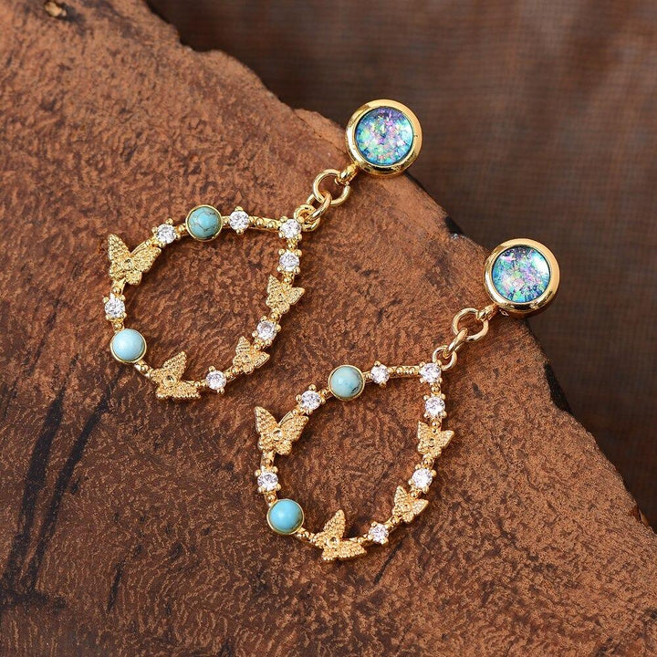 Handmade bohemian women's Elemental Opal Raindrop Earrings, featuring spiritual healing stones for unique style.