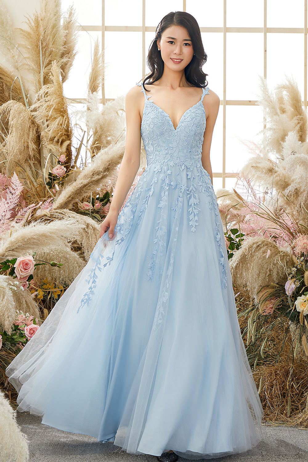 Women's formal embellished tulle evening gown, a sophisticated long dress for special events.