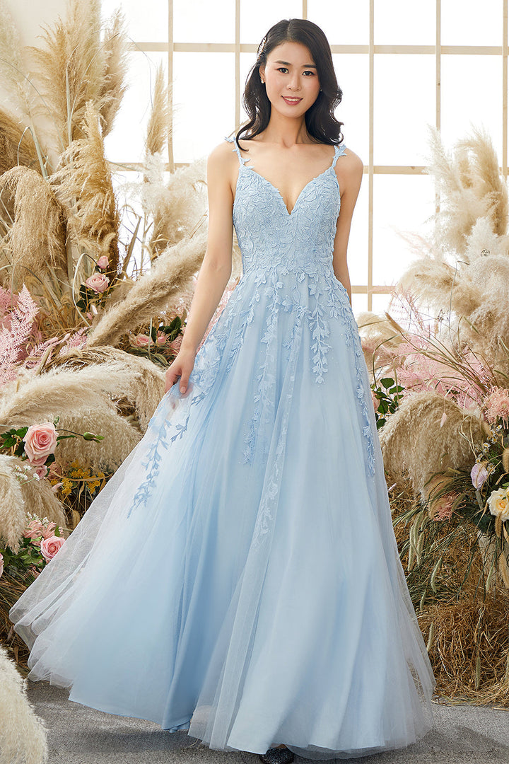 Women's formal embellished tulle evening gown, a sophisticated long dress for special events.