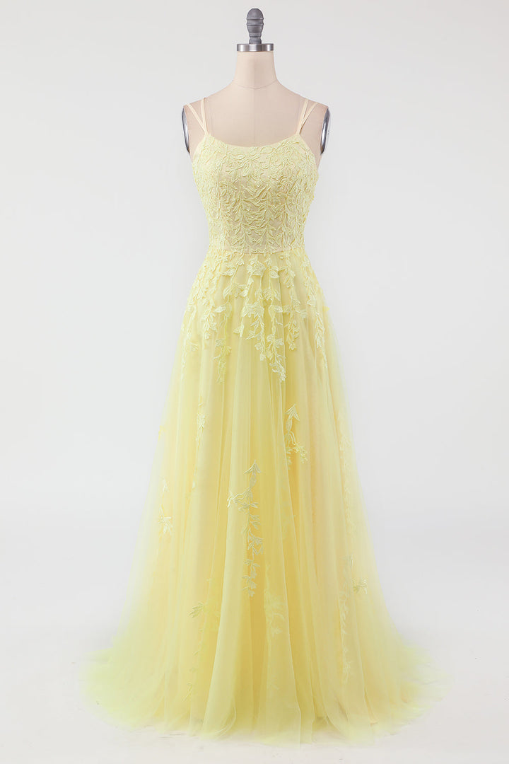 Elegant tulle evening gown with intricate appliqués & sparkling embellishments for women.