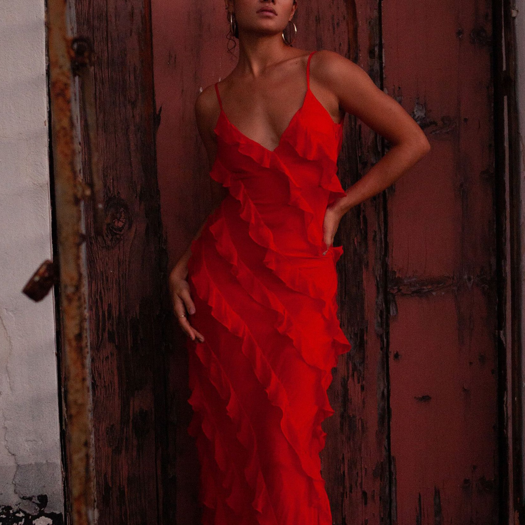 Close-up of the delicate embellishments on a stylish women's party wear maxi dress. Versatile & chic.