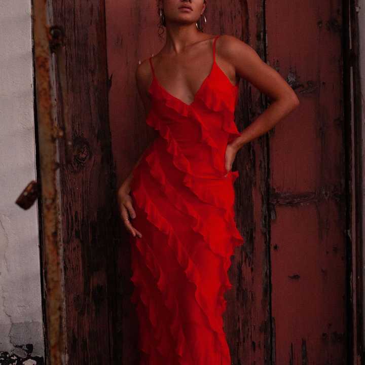 Close-up of the delicate embellishments on a stylish women's party wear maxi dress. Versatile & chic.
