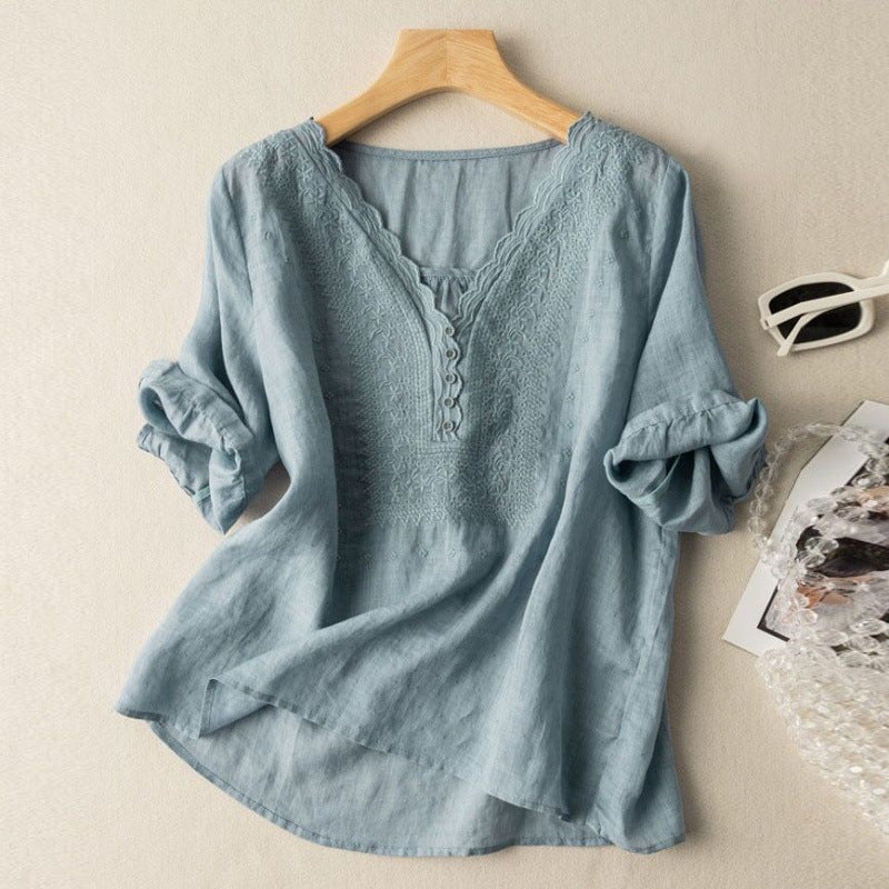 Versatile women's button-up blouse with delicate embroidery. Chic, relaxed fit long sleeve top for casual & elegant looks.
