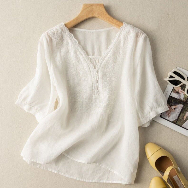 Chic women's embroidered long sleeve blouse for spring/summer. Relaxed fit, button-up, a comfortable & elegant everyday top.