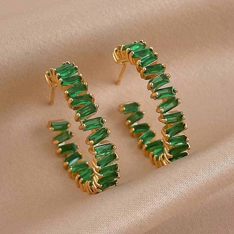 Sparkling emerald green crystal hoop earrings for women. Gold plated, elegant & a beautiful statement piece.
