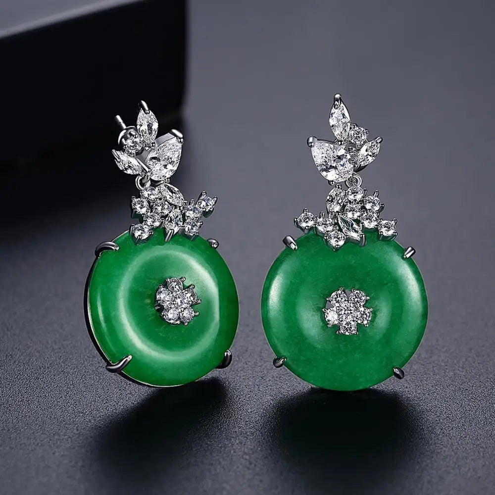 Stunning emerald green gemstone statement earrings for women, durable stainless steel design, perfect elegant accessory.