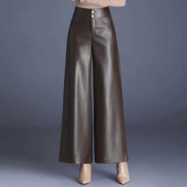 Chic women's high-rise wide-leg fashion pants, offering a comfortable fit and modern, elegant silhouette.