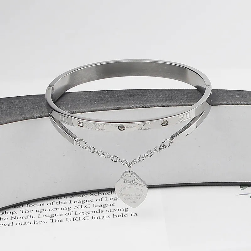 Timeless silver Eternal Love Bangle, a sleek and elegant women's bracelet, ideal anniversary gift.