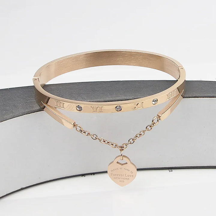 Luxurious gold Eternal Love Bangle Bracelet, elegant women's jewellery, timeless anniversary gift.