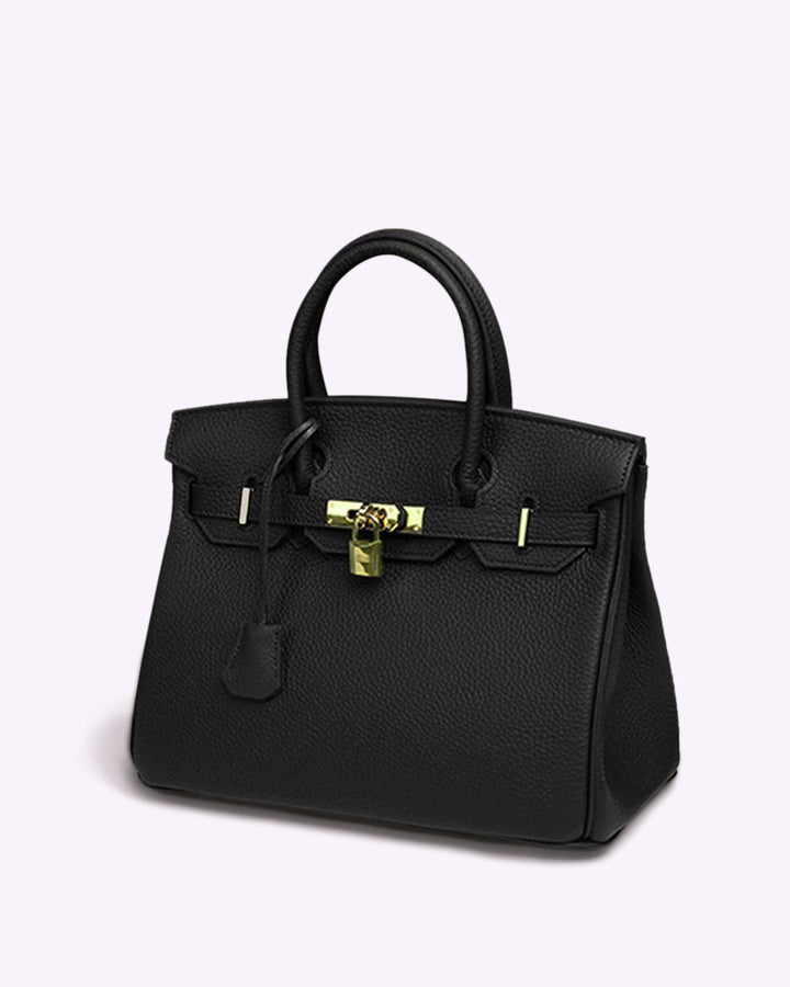 Sophisticated women's elegant faux leather handbag. Stylish vegan shoulder bag, versatile for any daily occasion.
