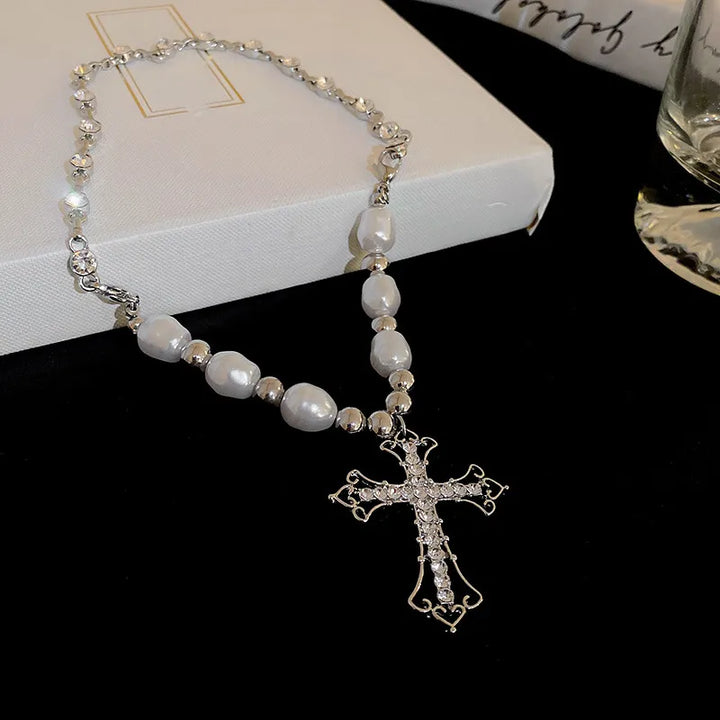 Dainty faux pearl cross pendant necklace with a sleek chain, perfect elegant women's jewelry and a timeless gift.