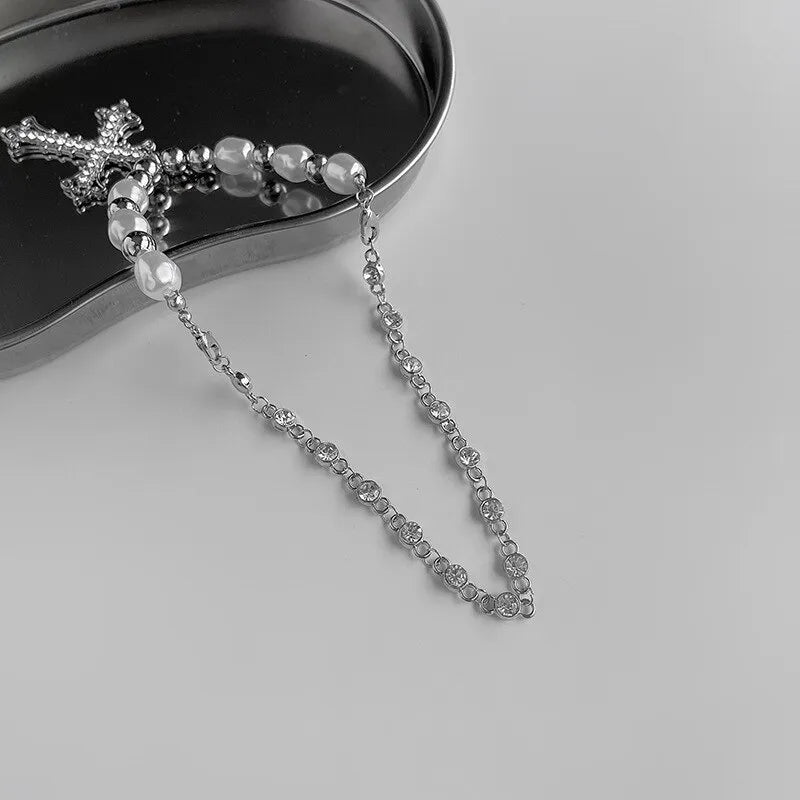 Modern elegant faux pearl cross pendant necklace, a dainty women's jewelry piece that adds timeless charm to any outfit.