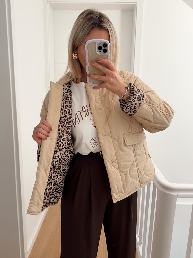Full-length view of the Narela women's fitted jacket in a chiffon blend, highlighting its elegant design and leopard lining.