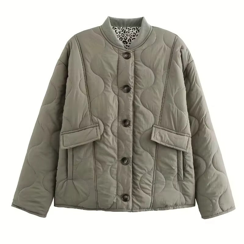 Detailed shot of the elegant Narela women's fitted jacket collar, revealing the chic leopard print lining.