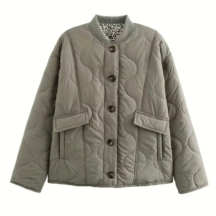 Detailed shot of the elegant Narela women's fitted jacket collar, revealing the chic leopard print lining.
