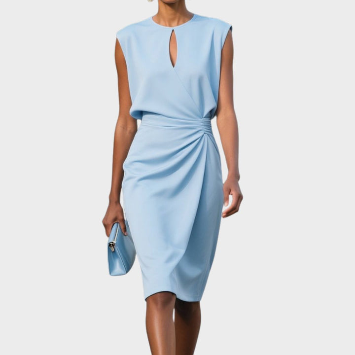 Elegant women's fitted sleeveless midi dress with side gathers. Perfect for professional workwear or stylish cocktail events.