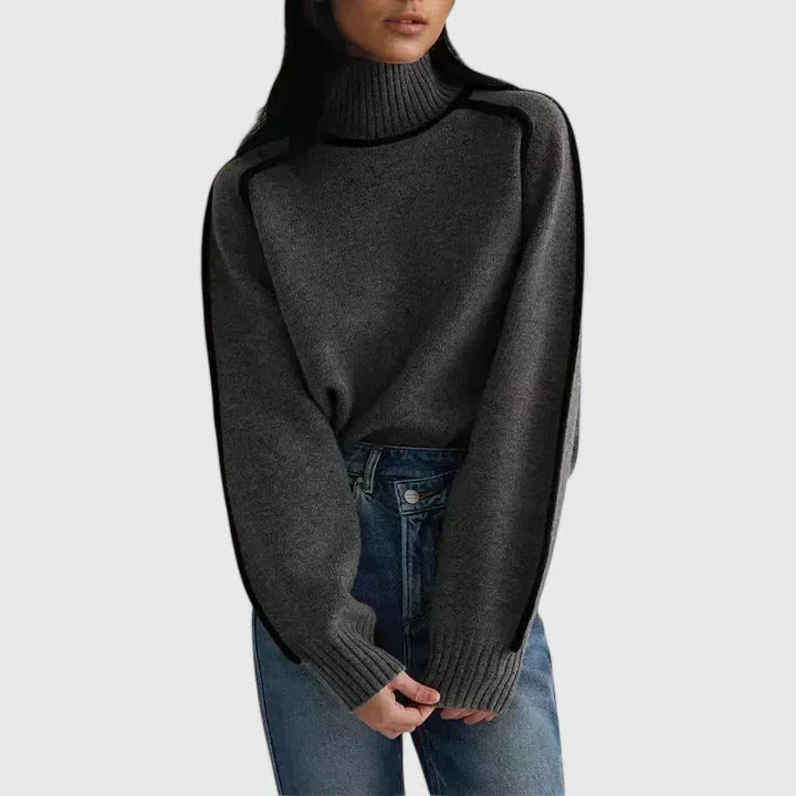 Versatile gray women's fitted sweater, perfect for everyday wear. Long sleeve, round neck, offering a chic & classic look.