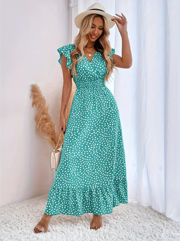 Trendy women's floral print midi dress featuring stylish ruffles and a vibrant summer design.