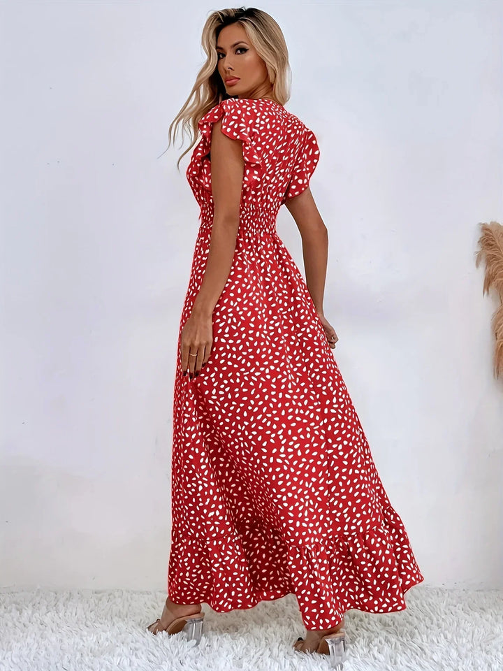 Flattering women's midi dress with a beautiful flora print and elegant ruffle details.
