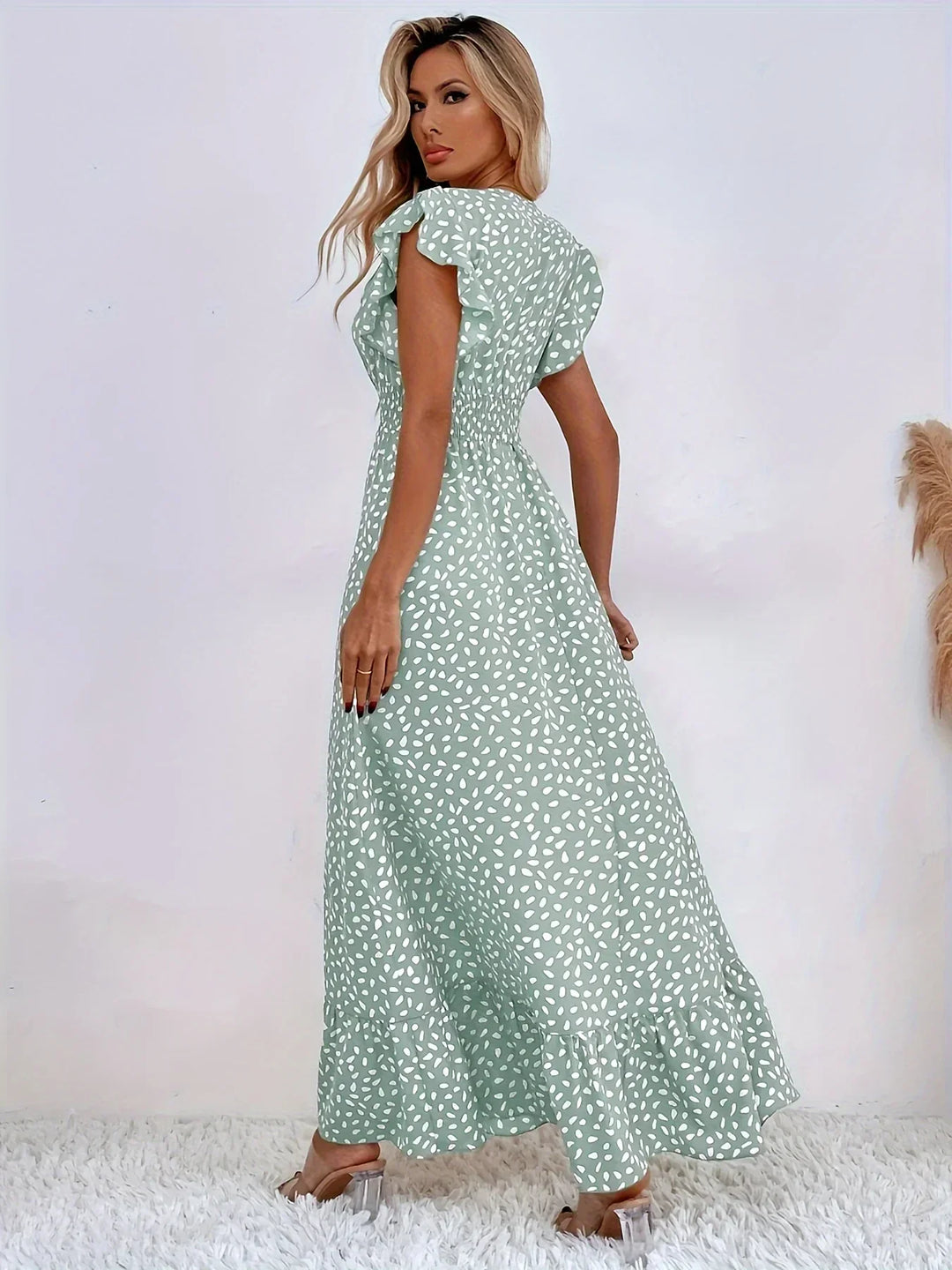 Vibrant flora print midi dress for women, offering a trendy and elegant ruffled style.